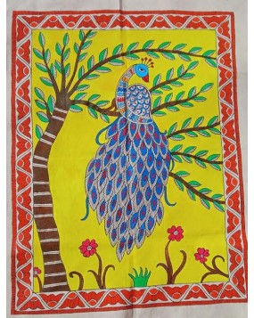Handmade peacock on a branch